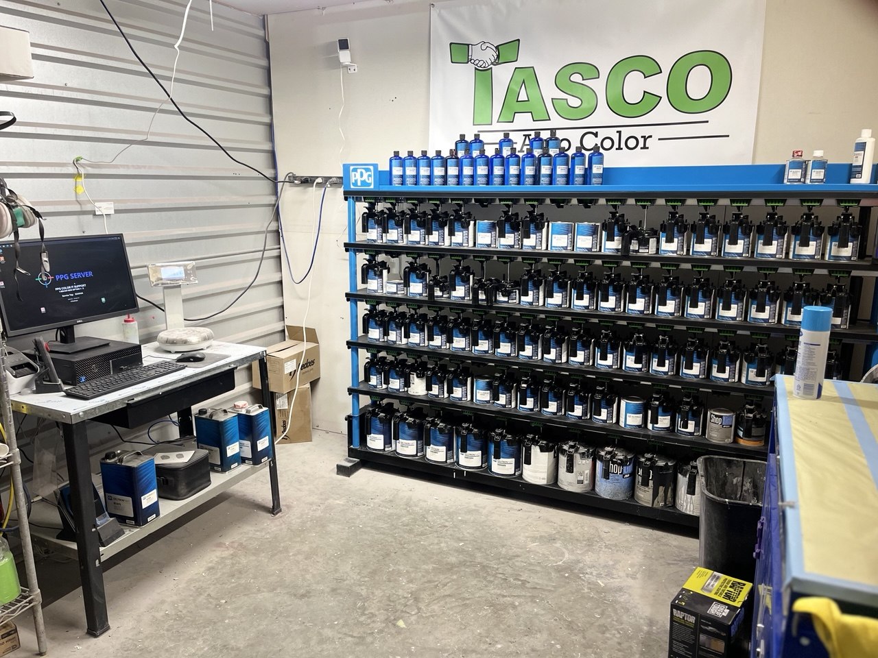 Professional PPG automotive paint mixing and color matching system at Hail Team One in Lubbock Texas