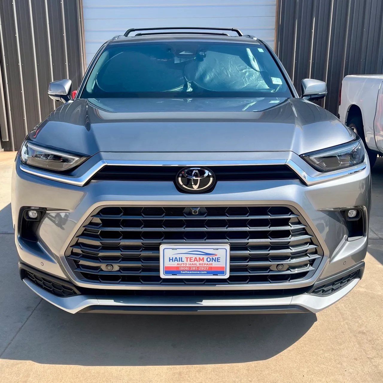 Toyota Highlander repaired by Hail Team One