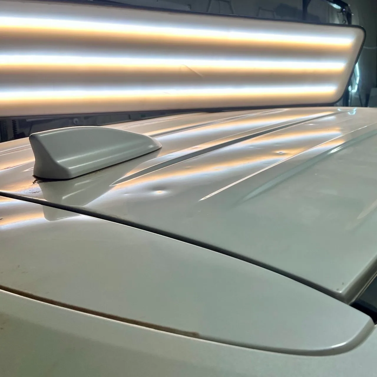 Hail damage roof dent inspection with PDR light at Hail Team One in Wolfforth Texas